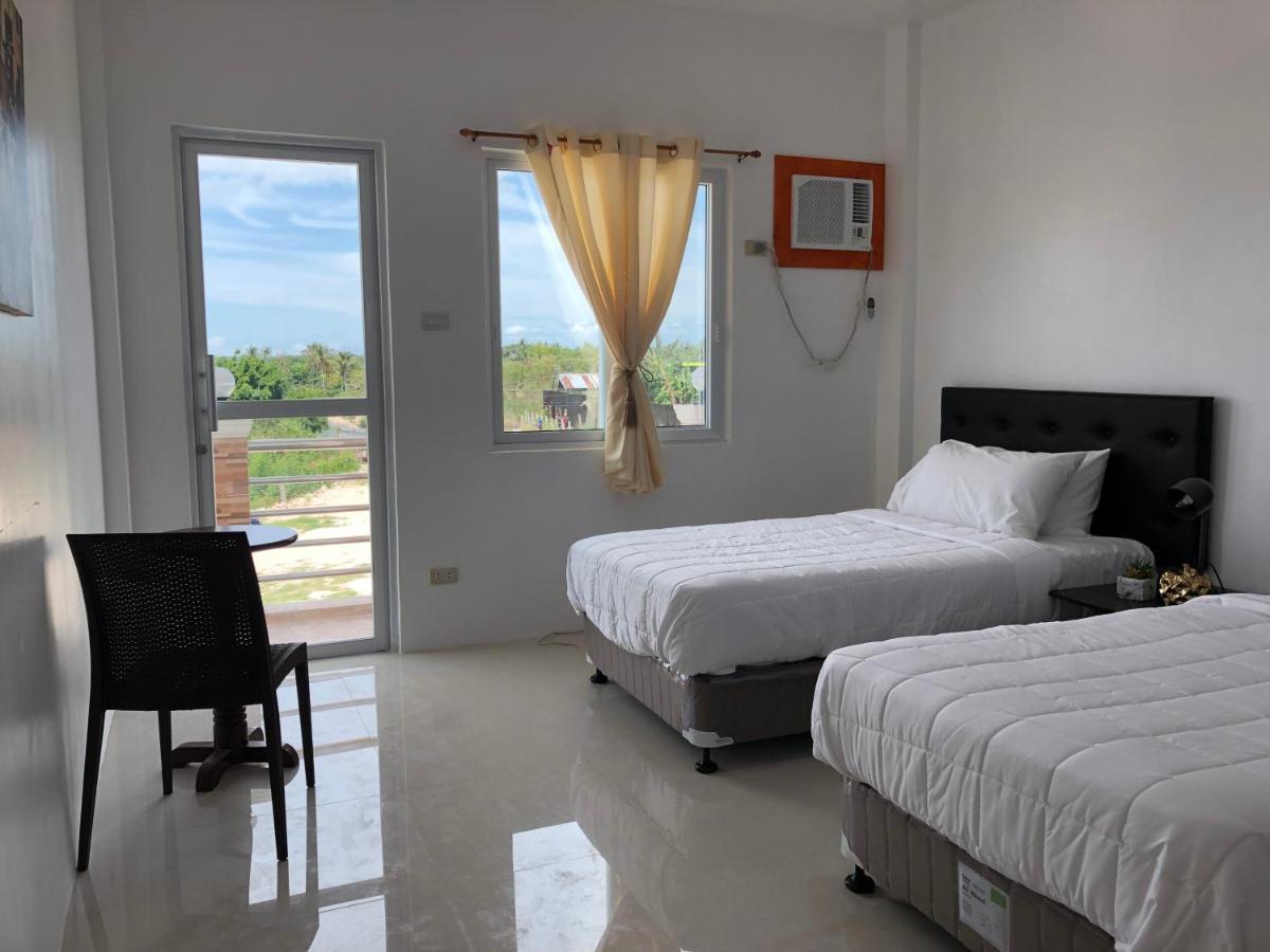 Arriyus Apartelle Daanbantayan Esterno foto