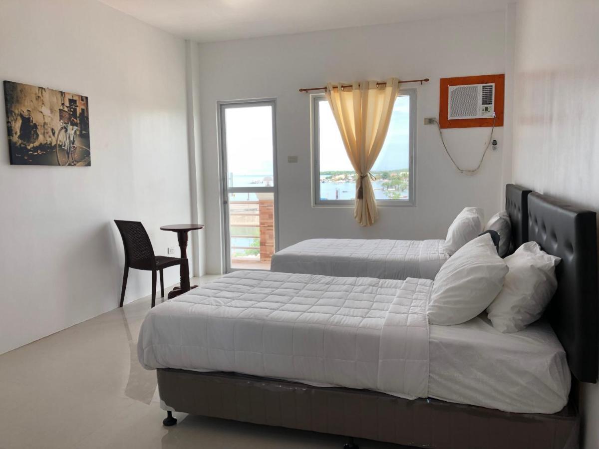 Arriyus Apartelle Daanbantayan Esterno foto